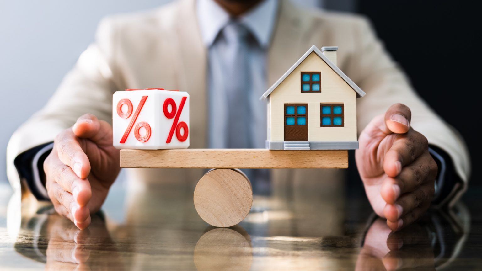 Balancing fluctuating interest rates and purchasing a home.