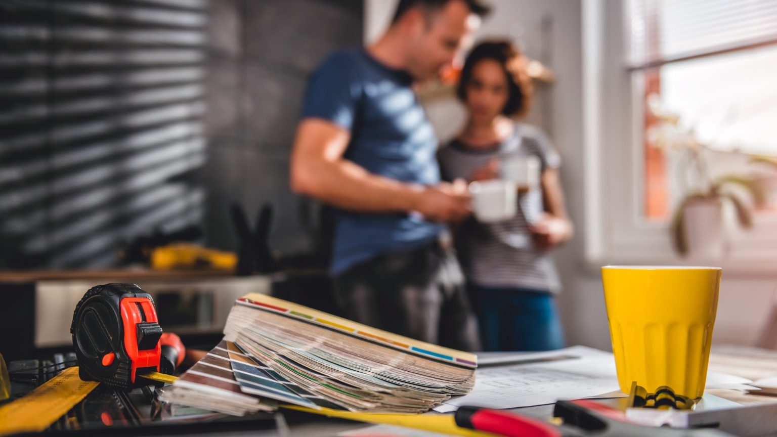 Couple conducting home improvements on their home.